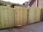 Scalloped wood fence